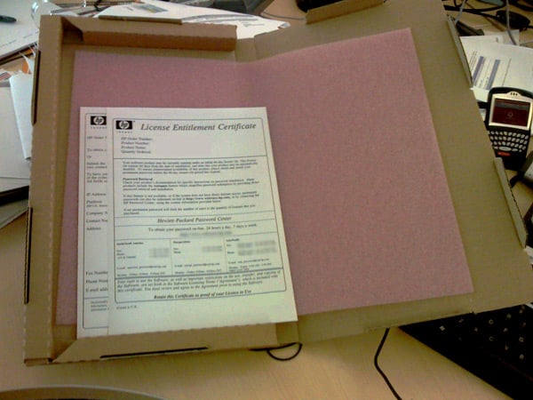 A smaller box containing two sheets of A4 paper