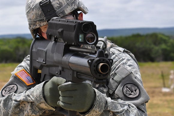 A soldier aims an XM-25 smartgun. Credit: PEO Soldier