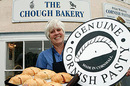 Cornish maiden bearing platter of genuine Cornish pasties. Photo: Cornish Pasty Association