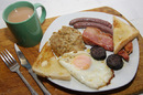 The full Spanglish breakfast: mealy pudding, bacon, black pudding, sausages, fried egg, toast