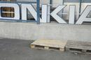 Nokia sign dismantled, with letters rearranged to spell 'ONKIA'