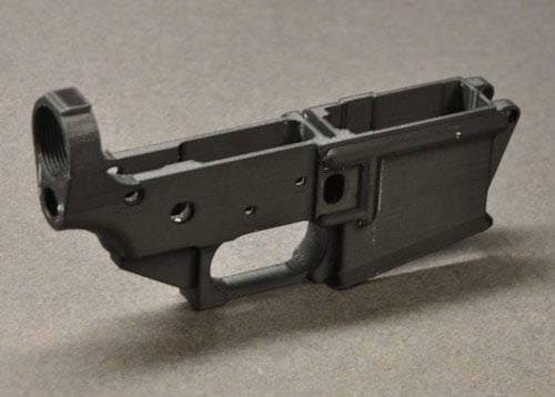Image of AR-15 rifle lower receiver printed on a 3D printer