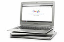 Photo of a stack of Google Chromebooks
