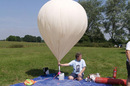 Dave Akerman inflates the balloon