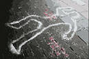 chalk outline of  human body at crime scene