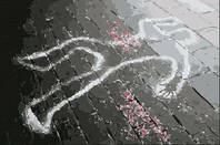 chalk outline of  human body at crime scene