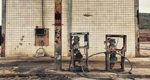 A rusty petrol pump at an abandoned gas station. Pic by Silvia B. Jakiello via shutterstock
