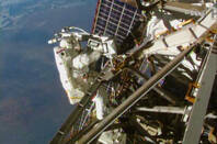 Spacewalking outside the ISS. Image credit: NASA TV