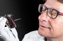 Dr Keevers with the prism solar cell