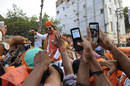 People photographing bollywood actor Vivek Oberoi with smartphones