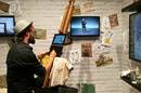 An artist sketches with Yoga Book