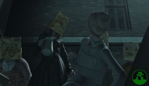 Prone school girl in courtyard bullied by peers, looming with spooky paper bags over their heads