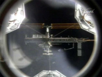 The International Space Station, as seen from the shuttle: NASA TV