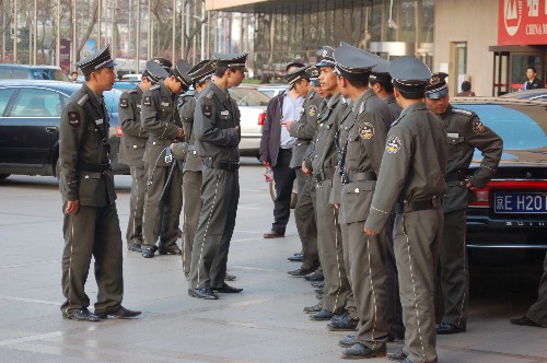 Shot of guards standing outside of IDF