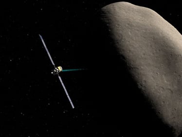 Artist's impression of Dawn flying past the dwarf-planet Ceres