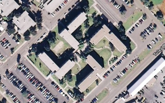 The swastika-shaped building as seen old Google Earth