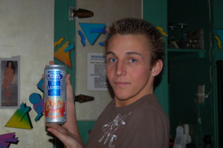 Shot of bartender holding Chelada drink