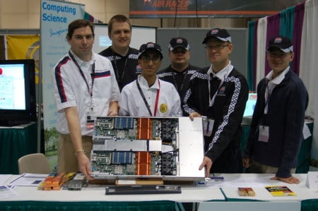 Shot of the Alberta team holding their SGI system 