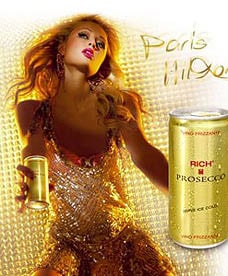 Paris hilton seen with can of Rich Prosecco in billboard ad