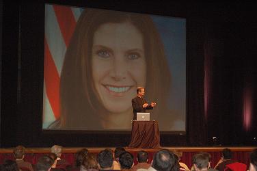 Lessing speaking at Stanford auditorium 