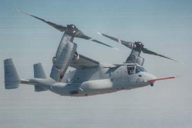 The V-22 with rotors tilting