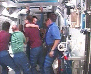 Discovery crew greeted by Expedition 17 members aboard the ISS. Pic: NASA