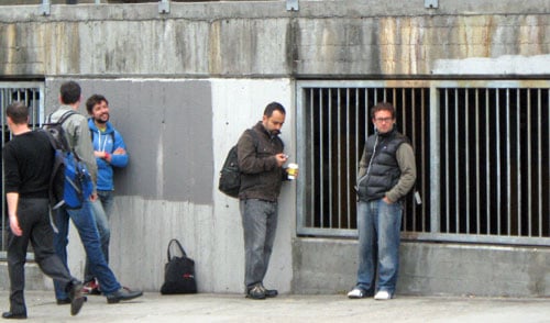 Google serfs waiting for Google bus in San Francisco