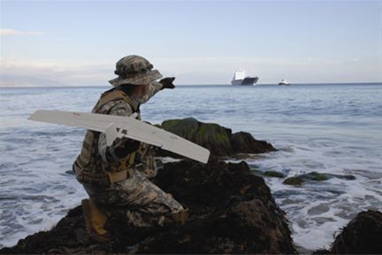 The Wasp microdrone launching from a beach