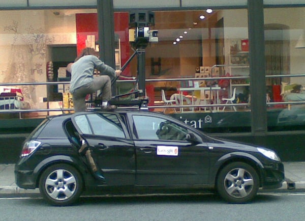 Street View operative clambers onto roof of Spycar