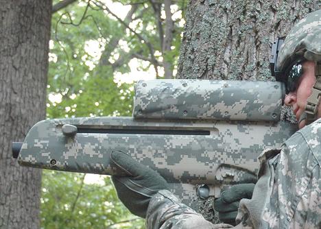 The XM-25 wireless smartshell gun in an Army press shot