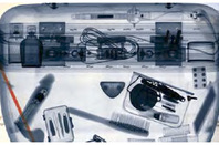 X-ray image showing vibrator in passenger's luggage