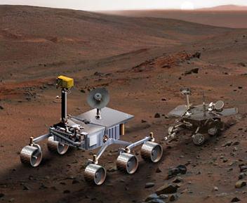 The new MSL mega-rover next to one of the current ones