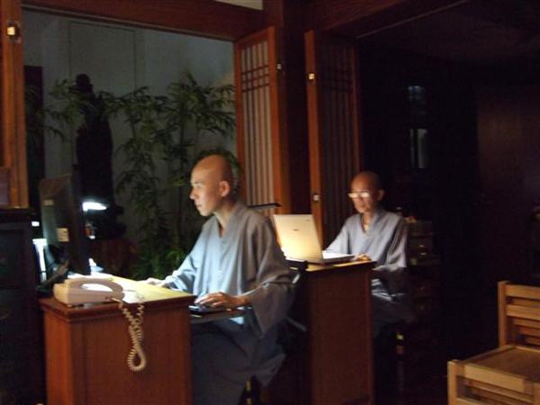 Monks at their laptops