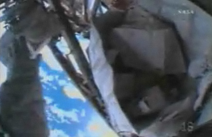 The toolbag at the moment of its escape. Pic: NASA TV