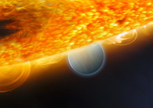 NASA art depicting the 'hot Jupiter' HD189733b in orbit round its parent orange dwarf