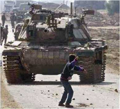 Person throwing rock at tank