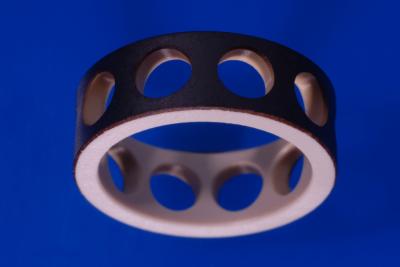 A plastic bearing cage, coated in artificial diamond by the Fraunhofer IWM