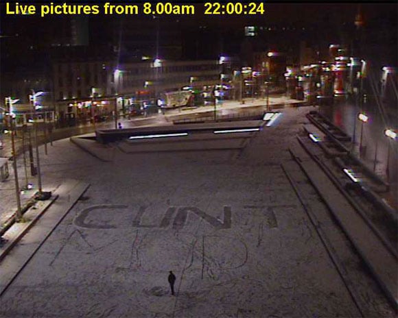 Still from CCTV in Nottingham showing giant 'c*nt' written in snow