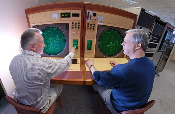 TNMOC Trustee and Director Kevin Murrell and TNMOC volunteer Tony Frazer operating a PDP11 radar station computer