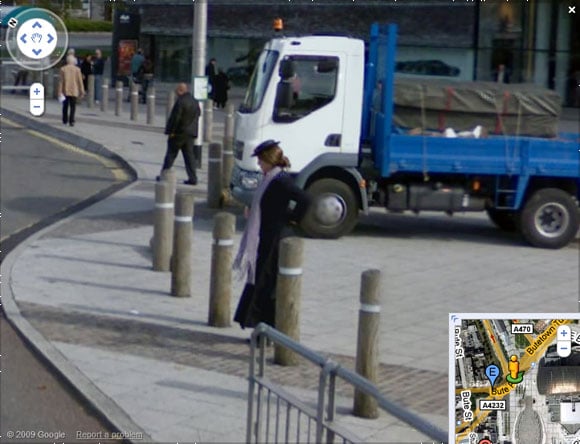 Street View grab showing ghost is actually woman in fancy dress