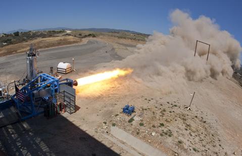 The SpaceShipTwo hybrid rocket in ground testing. Credit: Virgin Galactic