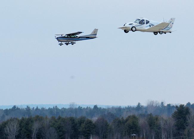 The Terrafugia Transition in flight tests accompanied by chase plane