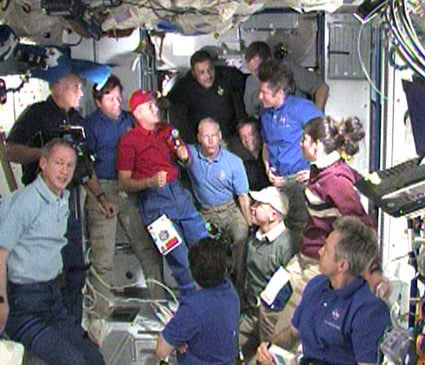 Discovery and Expedition 20 crew bid farewell. Pic: NASA