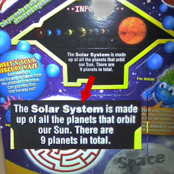 Happy Meal box showing nine planets, including Pluto