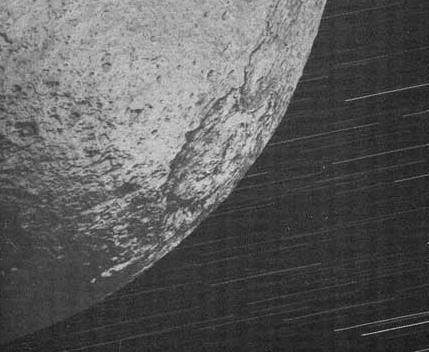 Long-exposure shot of Iapetus, moon of Saturn, taken by the Cassini probe. Credit: NASA