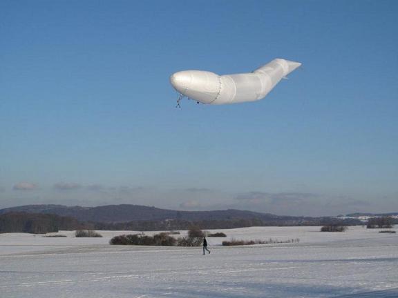 The STS-111 unmanned airship in test flight above Germany. Credit: Sanswire-TAO