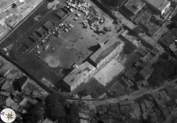 Earthquake victims gather on a football field