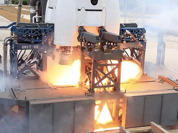 The Falcon 9 spits fire briefly during an aborted static test. Credit: SpaceX