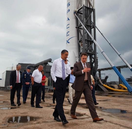 Elon Musk bends the President's ear at Cape Canaveral. Credit: The White House