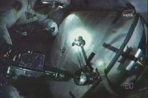 Spacewalkers bolt old battery to Integrated Cargo Carrier. Pic: NASA TV